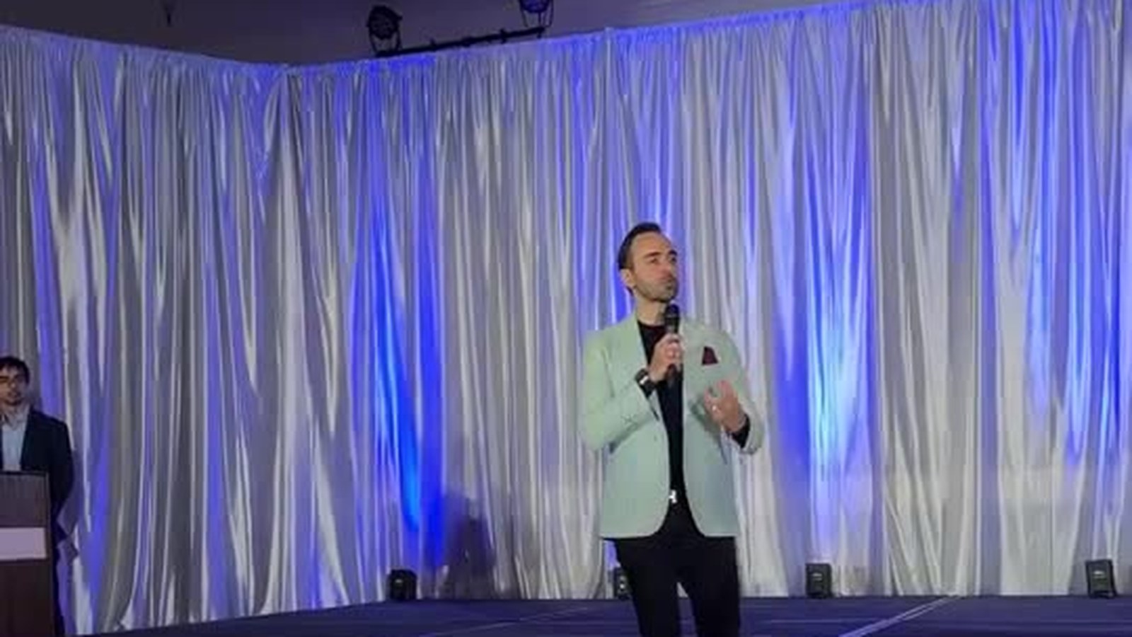 AI X Factor Live main stage — the room mid-session